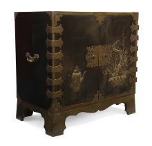 A Japanese lacquered cabinet, Edo period, 18th century, Decorated to the pair of doors with a cof...