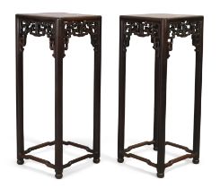 A pair of Chinese hongmu square jardinière stands, Qing dynasty, 19th century, The square marble ...