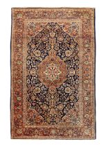 A Persian Kashan rug, Second quarter 20th century,    The central field with floral medallion sur...