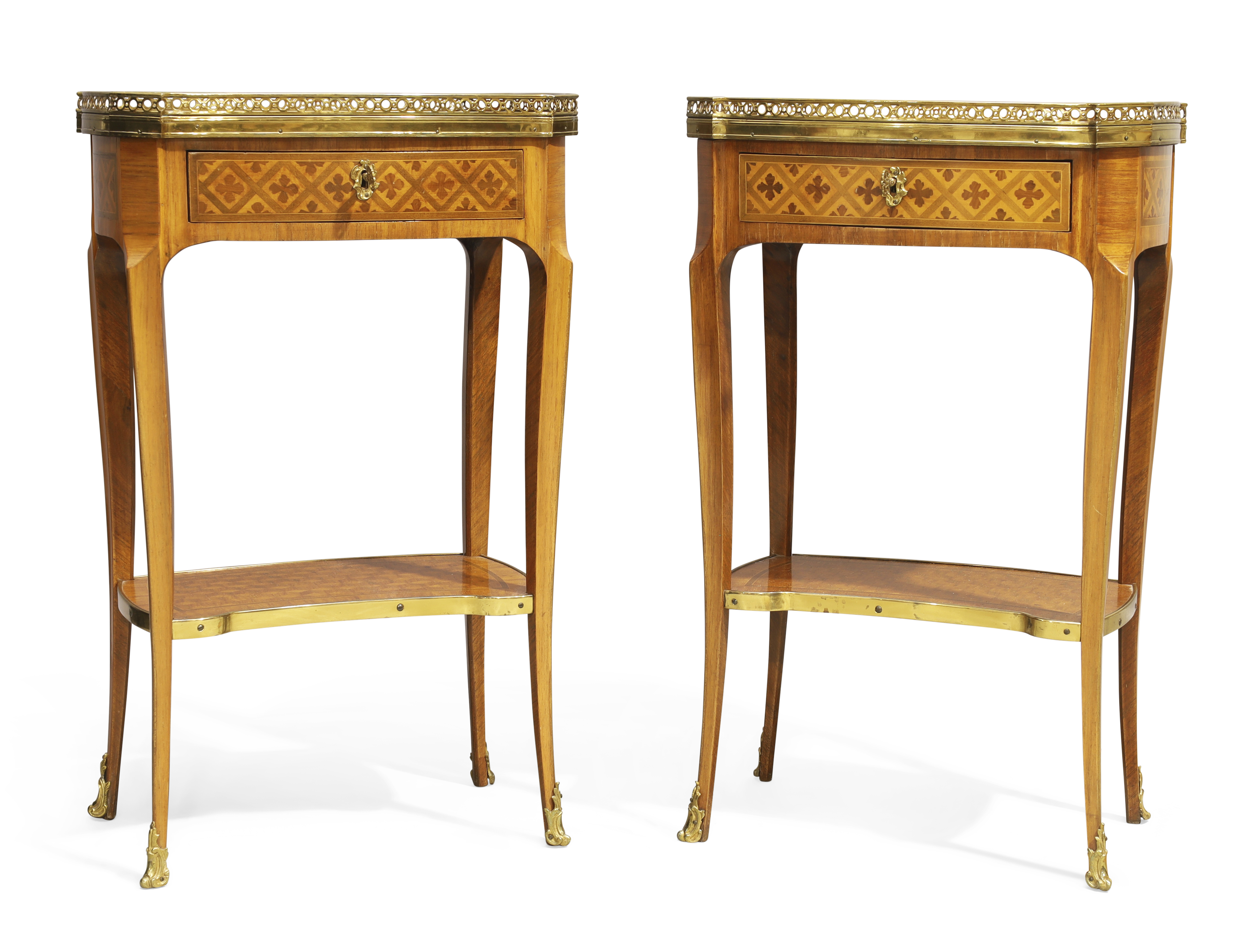 A pair of French inlaid kingwood bedside tables, First quarter 20th century, With brass galleried...