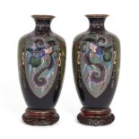 A pair of Japanese cloisonné baluster vases, Meiji period, Each decorated with four alternating l...