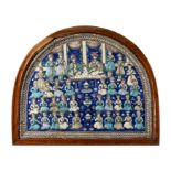 A large framed hemispherical moulded polychrome figural pottery tile, Tehran, Qajar Iran, c.1860,...