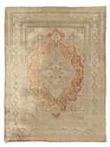 A Persian silk Tabriz rug, Last quarter 19th century,  The central field with floral medallion su...