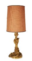 A French gilt-bronze candlestick converted to a lamp, In the style of Juste-Aurèle Meissonier, Fr...