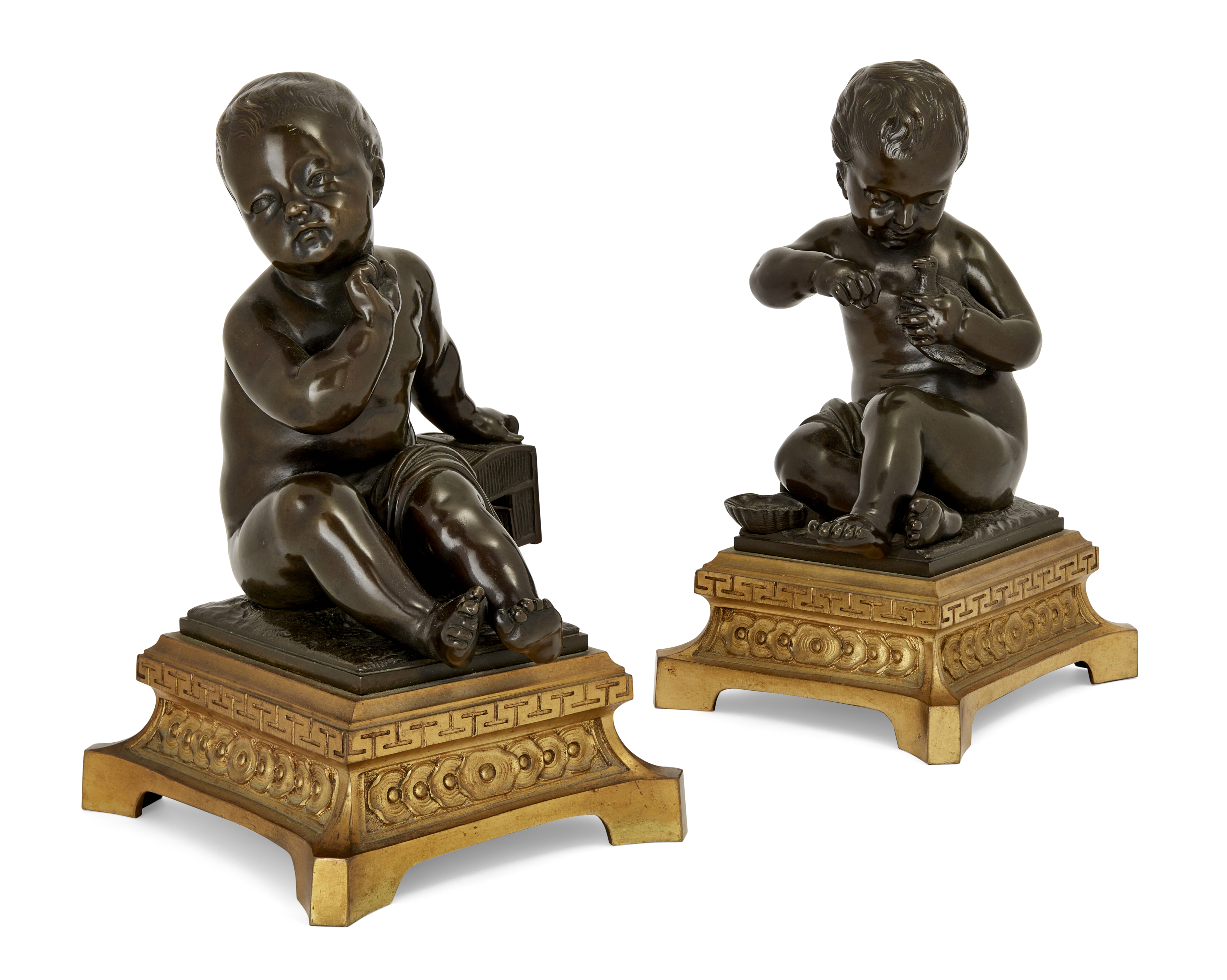 After Jean-Baptiste Pigalle, French, 1714-85, a pair of French bronze figures ‘L’enfant a la cage...