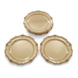 A set of ten Elizabeth II silver-gilt plates, London, 1970, Collingwood & Co., Of shaped circular...