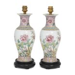 A pair of Chinese famille rose baluster vases converted to lamps, Mid-20th century, Each painted ...
