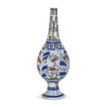 A pyriform polychrome pottery vase, Qajar Iran, c.1880, Loosely inspired by Iznik pottery, on spl...