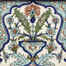 An Iznik-style pottery tile, Kutahya, Turkey or Europe, 20th century, A floral spray rising from ...