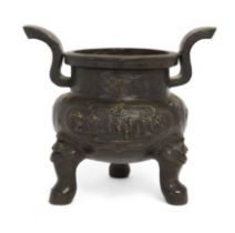 A large Chinese bronze archaistic tripod censer, Ming dynasty, 17th century, Decorated to the bod...