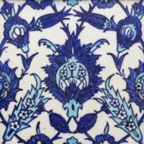 A framed square cobalt and turquoise blue Iznik style pottery tile, Kutahya, Turkey or Europe, 20...