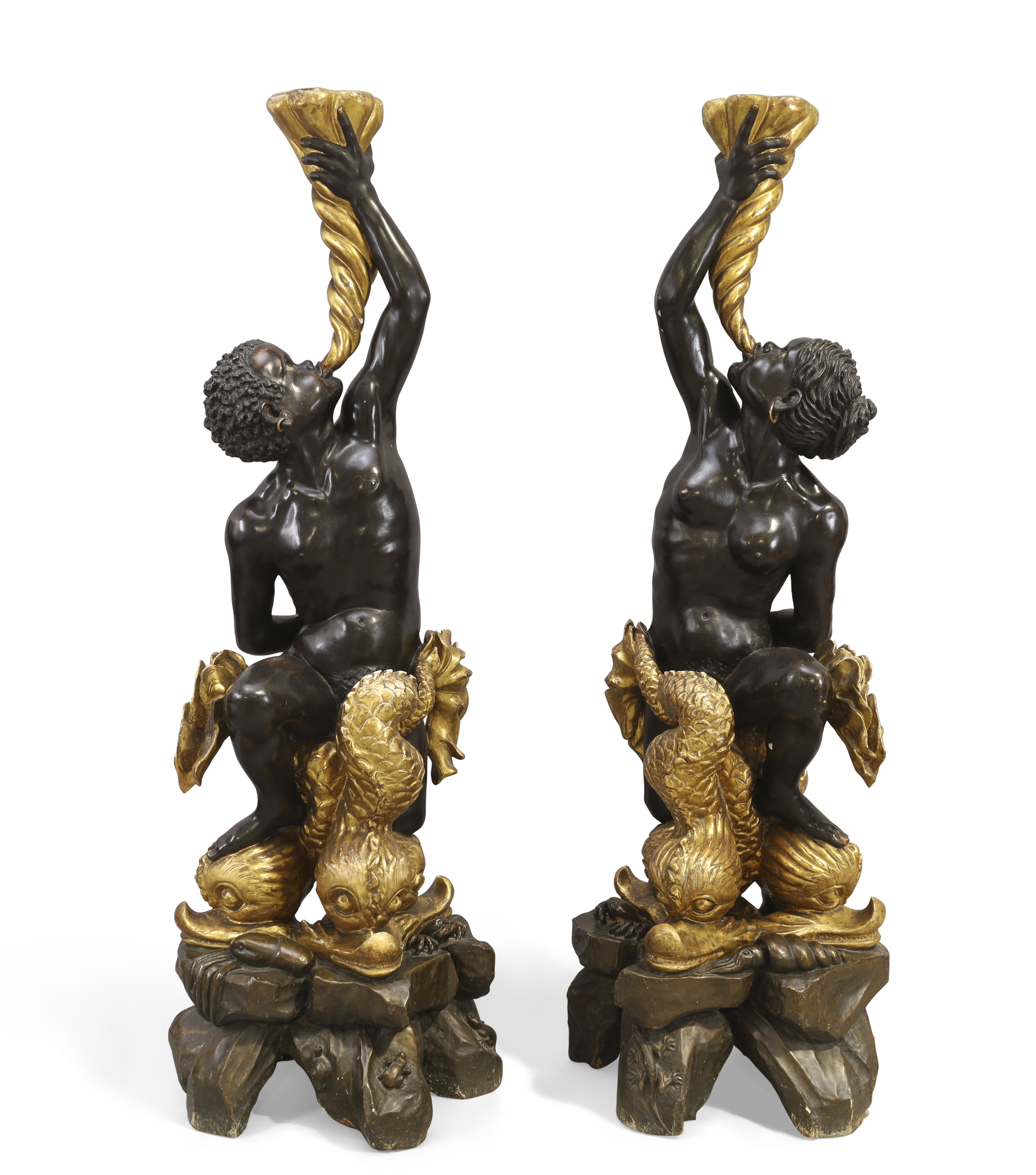A pair of large Venetian polychrome and giltwood figural torcheres, Late 19th century, Modelled a...