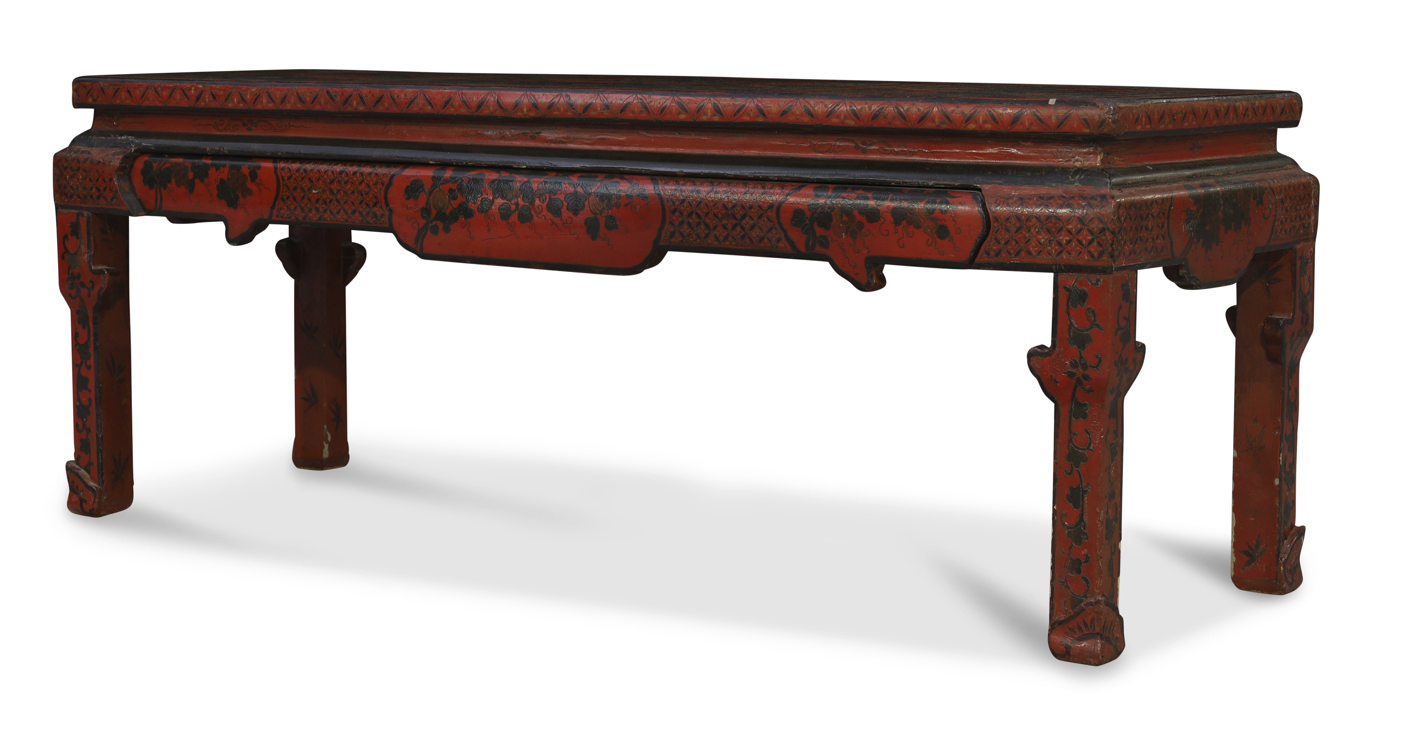A Chinese red lacquer rectangular table, Late Qing dynasty, The top surface painted and incised w...