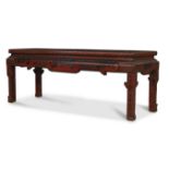 A Chinese red lacquer rectangular table, Late Qing dynasty, The top surface painted and incised w...