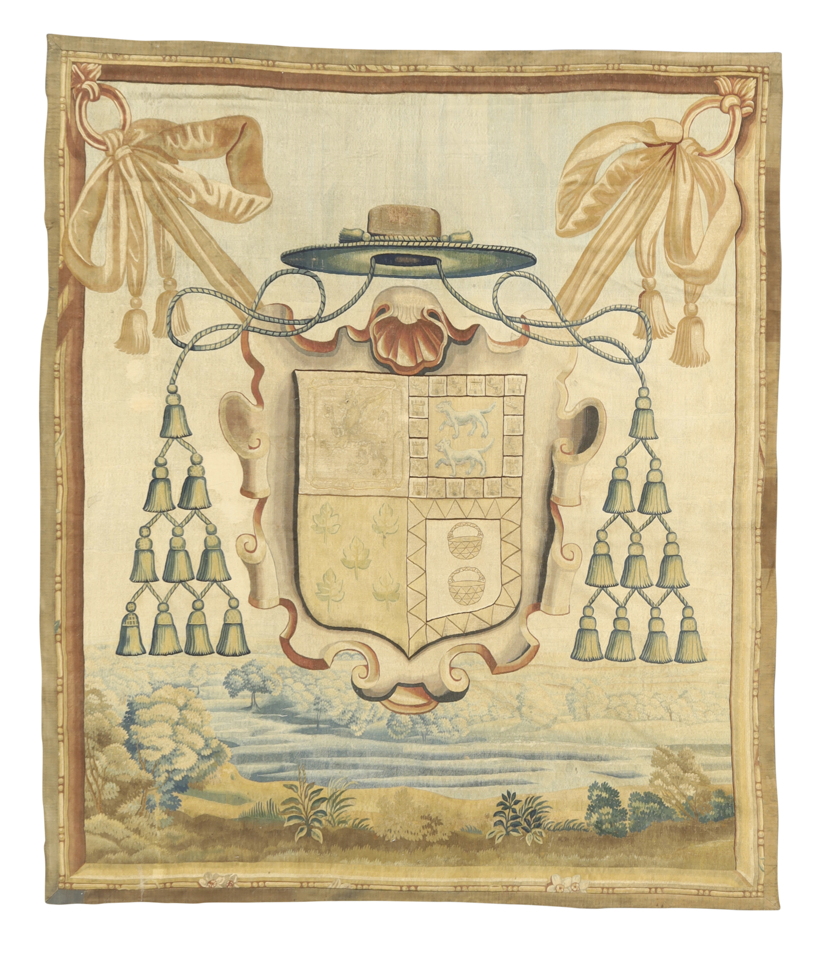 A Flemish armorial tapestry, Possibly Brussels, 17th century, Woven in wools and silks with the c...