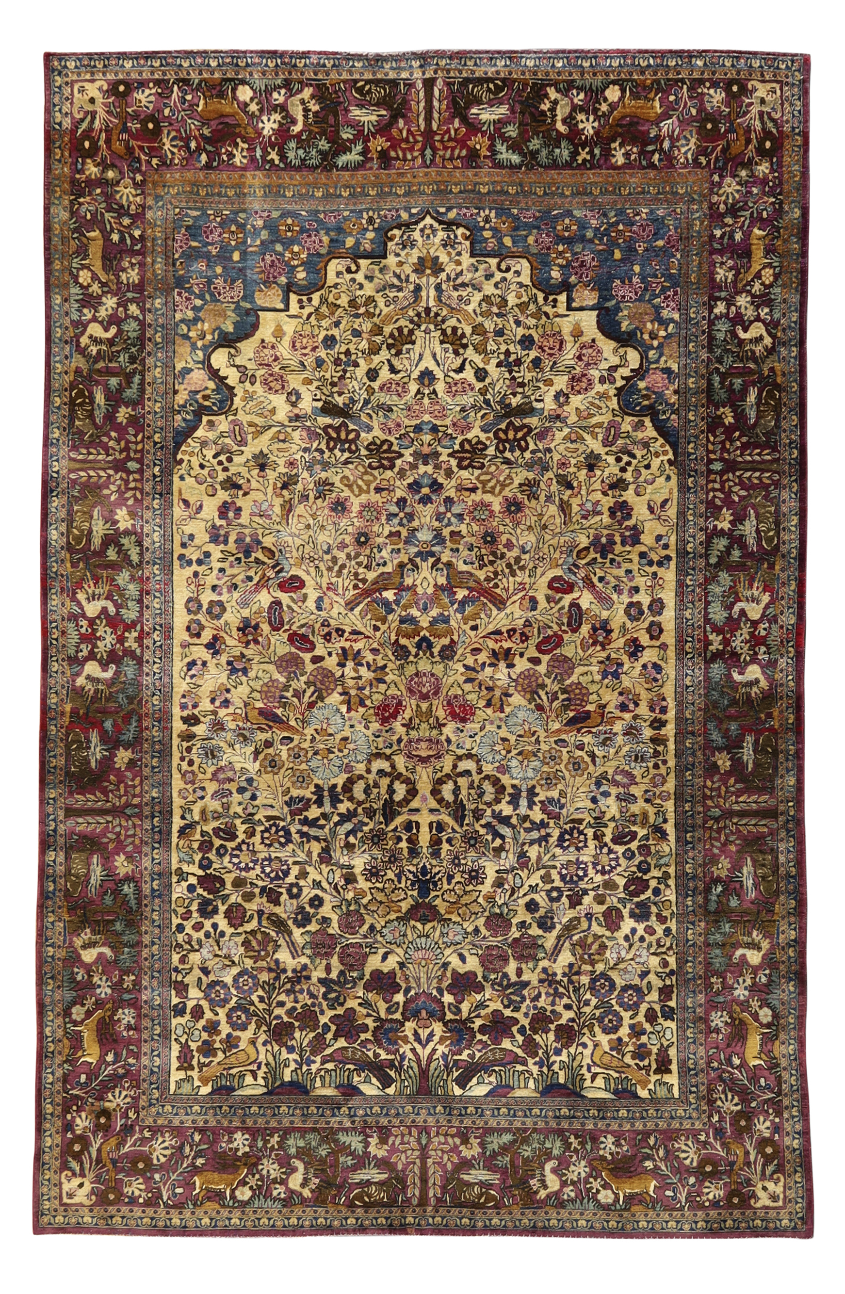 A Persian silk Kashan rug, First quarter 20th century,  The central field with vase of flower des...