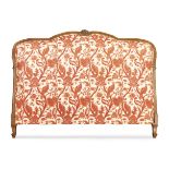 A French carved fruitwood headboard, Of Louis XV style, second half 20th century,  With matching ...