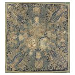 A North German armorial tapestry panel,  Mid-17th century,  Woven in wools and silks, with an ang...