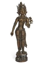 A large Sino-Tibetan copper alloy figure of Padmapani, 20th century, Cast with hips gently swayin...