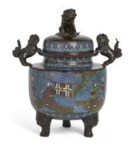 A large Japanese champlevé-enamel bronze tripod censer, Meiji period, Cast with lion handles and ...