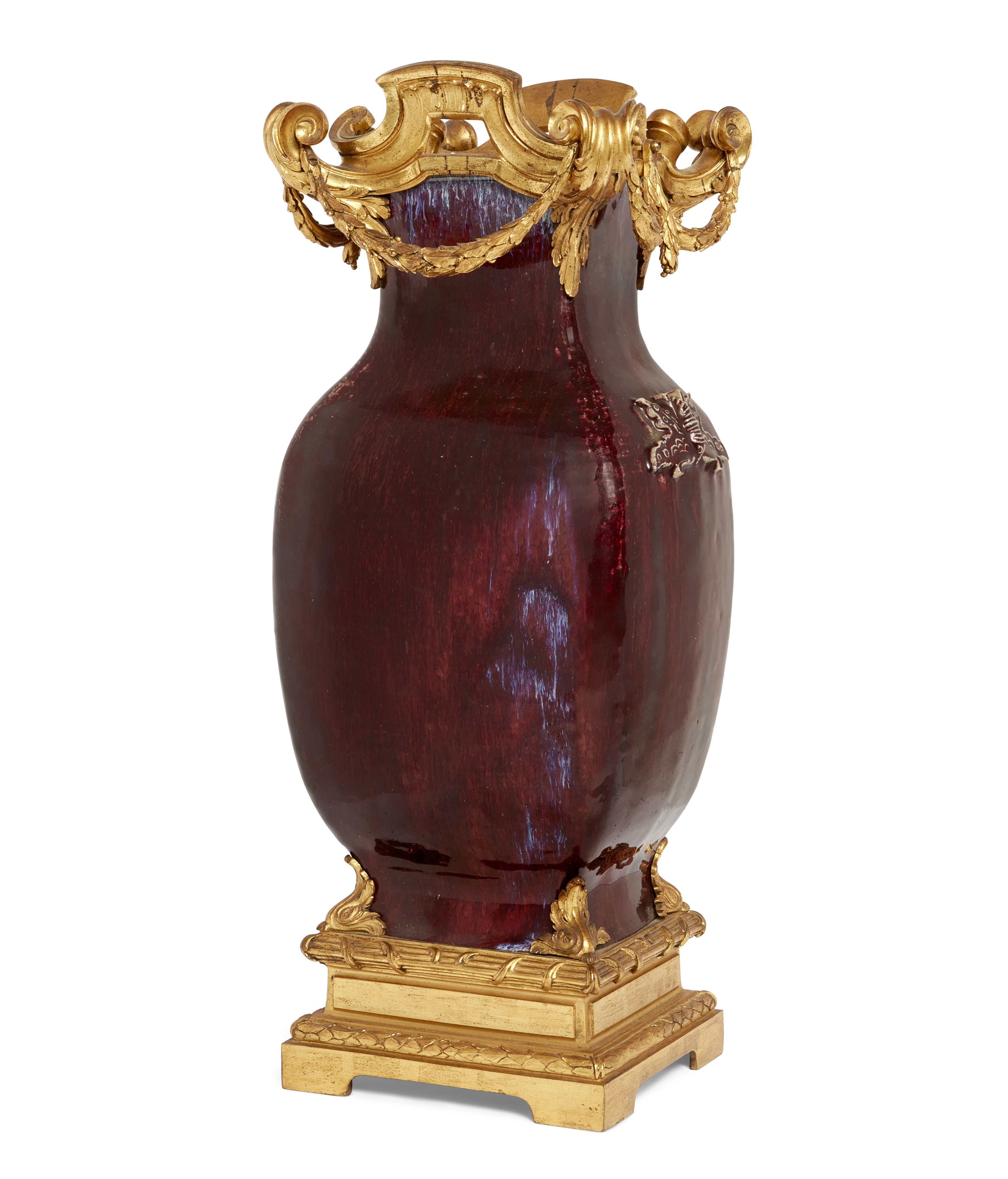 A Chinese ormolu mounted flambé-glazed vase, hu, 18th century, The vase moulded with butterfly fo...