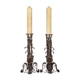 A pair of Spanish wrought-iron floor-standing andiron/candlesticks, Of Gothic style, 19th century...