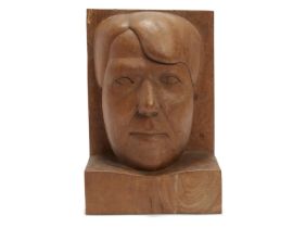 Ronald Moody,  Jamaican/British 1900-1984 -  Head of a Woman; elm, signed on the edge of the ba...