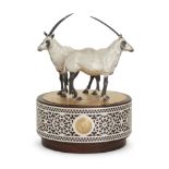 A parcel gilt silver Arabian oryx sculpture.  George Grant Macdonald,  London, 2020.  The pair...