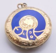 A Victorian gold enamel buckle locket. 2.3 cm diameter.