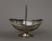 A Victorian pierced silver basket. 19 cm long. 269.1 grammes.