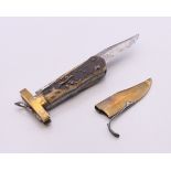 A 19th century antler handled folding knife with brass tip cover. 22 cm long open.