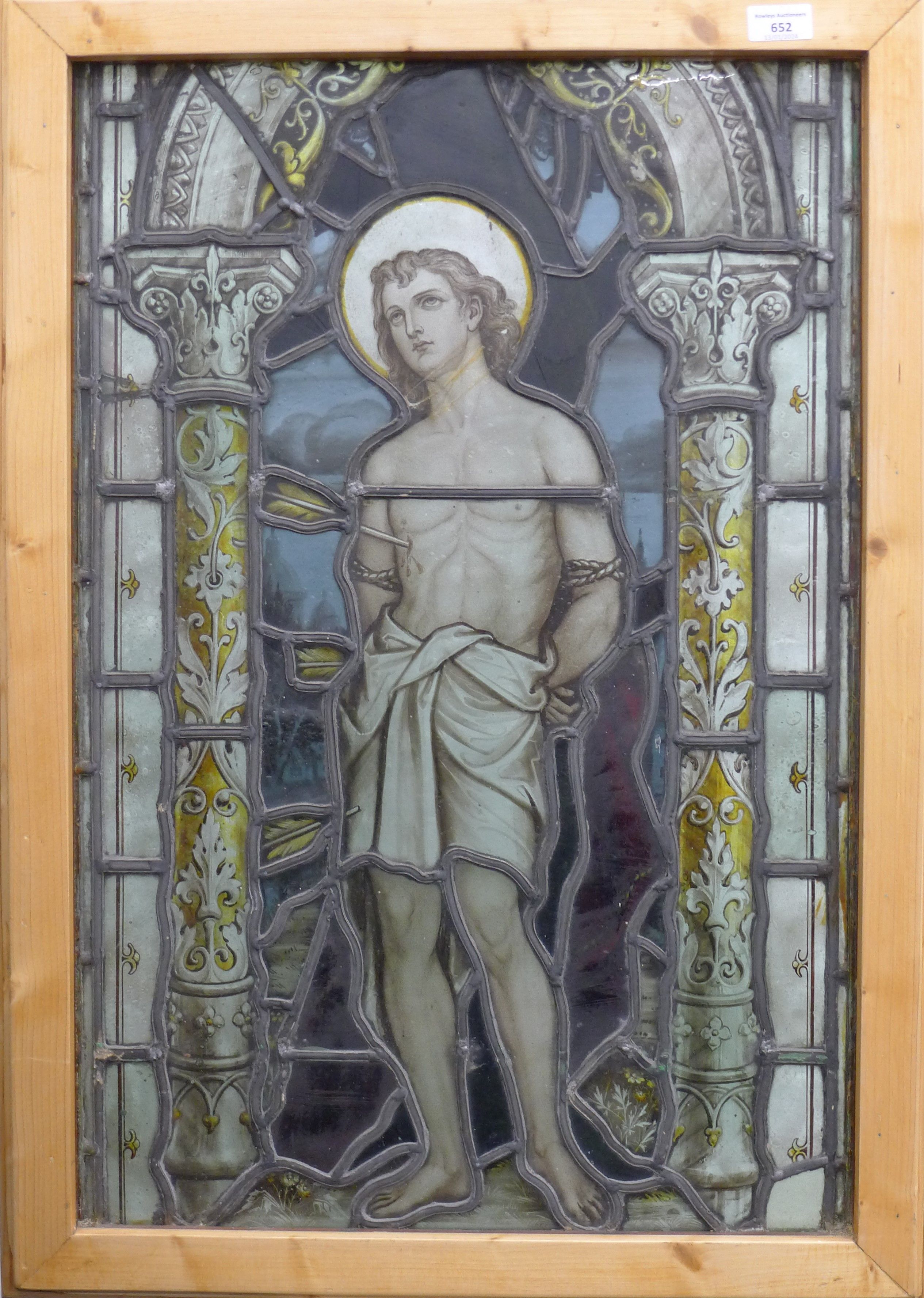 An antique stained leaded glass panel depicting the Martyrdom of Saint Sebastian, - Image 2 of 3