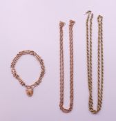 Two 9 ct gold chains and a 9 ct gold bracelet. The longest 68.5 cm. 30 grammes.