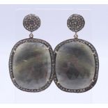 A pair of agate and diamond earrings. 5 cm high.