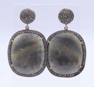 A pair of agate and diamond earrings. 5 cm high.