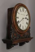 A Victorian oak fusee dial clock, the base inscribed 'W Potts & Sons Leeds'. 46 cm wide.