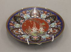 A late 19th/early 20th century cloisonne dish. 18.5 cm diameter.