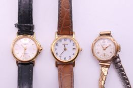 Three ladies wristwatches, including a 9 ct gold cased example. The latter 2 cm wide.