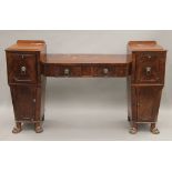 A Regency mahogany sideboard. 187 cm wide.