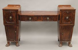 A Regency mahogany sideboard. 187 cm wide.