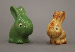 Two small Goss porcelain rabbits. The largest 4.5 cm high.