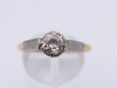 An 18 ct gold 0.5 carat diamond solitaire ring. Ring size Q. 4 grammes total weight.