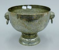 A niello decorated Siamese unmarked white metal pedestal bowl with dog-of-fo mask handles.