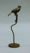 A bronze bird on stand. 16 cm high.