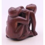 An erotic carving. 5 cm high.