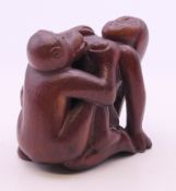 An erotic carving. 5 cm high.