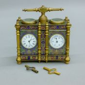 A cloisonne combination clock and barometer. 12.5 cm wide.