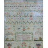 A framed and glazed Victorian sampler worked by Ellen Ann Grover, Aged Seven Years, dated 1839.
