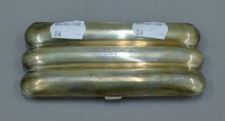 A silver cigar case. 13 cm long. 85.2 grammes.