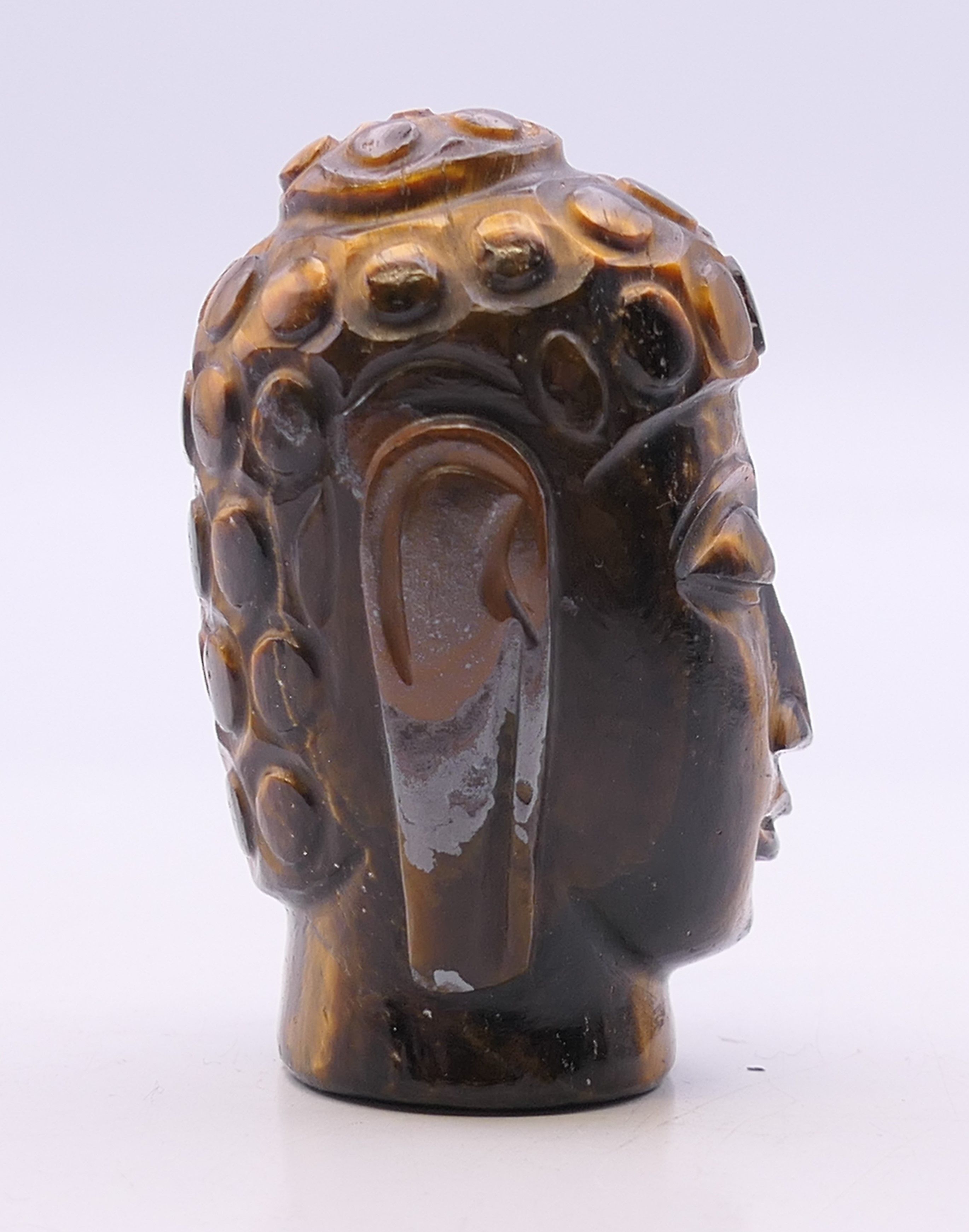 A tigerseye bust of Buddha. 5.5 cm high. - Image 3 of 5